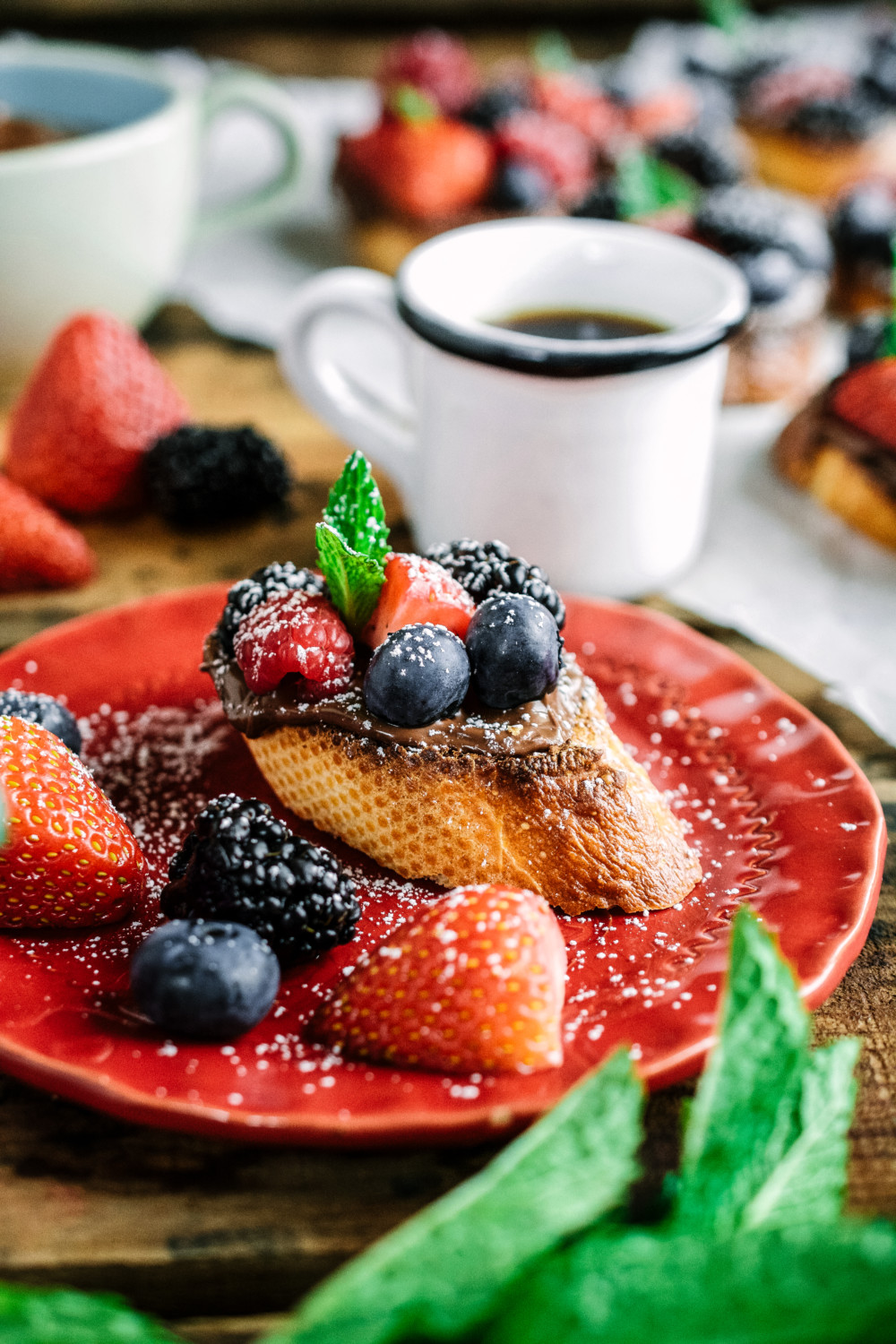Fresh Berry & Nutella Crostini are a must for Valentine's Day! ciaochowbambina.com #ValentinesDay #crostini #nutella #ciaochowbambina